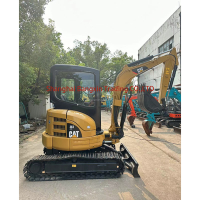 700 werkuren Tweedehands graafmachine CAT 303 met een capaciteit van 0,23 m3