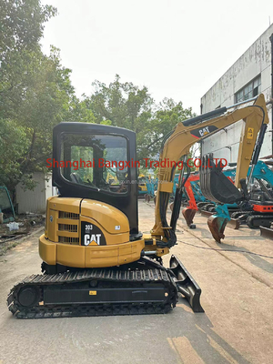 700 werkuren Tweedehands graafmachine CAT 303 met een capaciteit van 0,23 m3